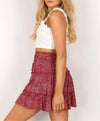 Elastic waist tiered floral mini skirt