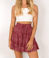 Elastic waist tiered floral mini skirt