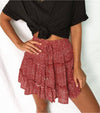 Elastic waist tiered floral mini skirt