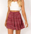 Elastic waist tiered floral mini skirt