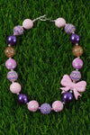 PURPLE TONE BUBBLE GUM BEAD NECKLACE W/BOW SIDE PENDANT .