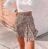 Elastic waist tiered floral mini skirt